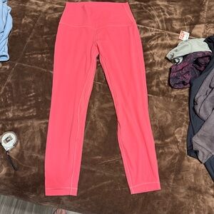 Woman’s size 8 Lululemon dark Coral Leggings